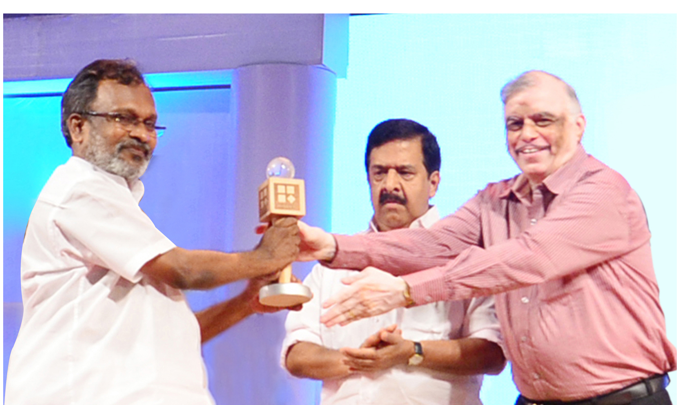 Receiving Best Leadership Award from Kerala Governor Justice P. Sathasivam